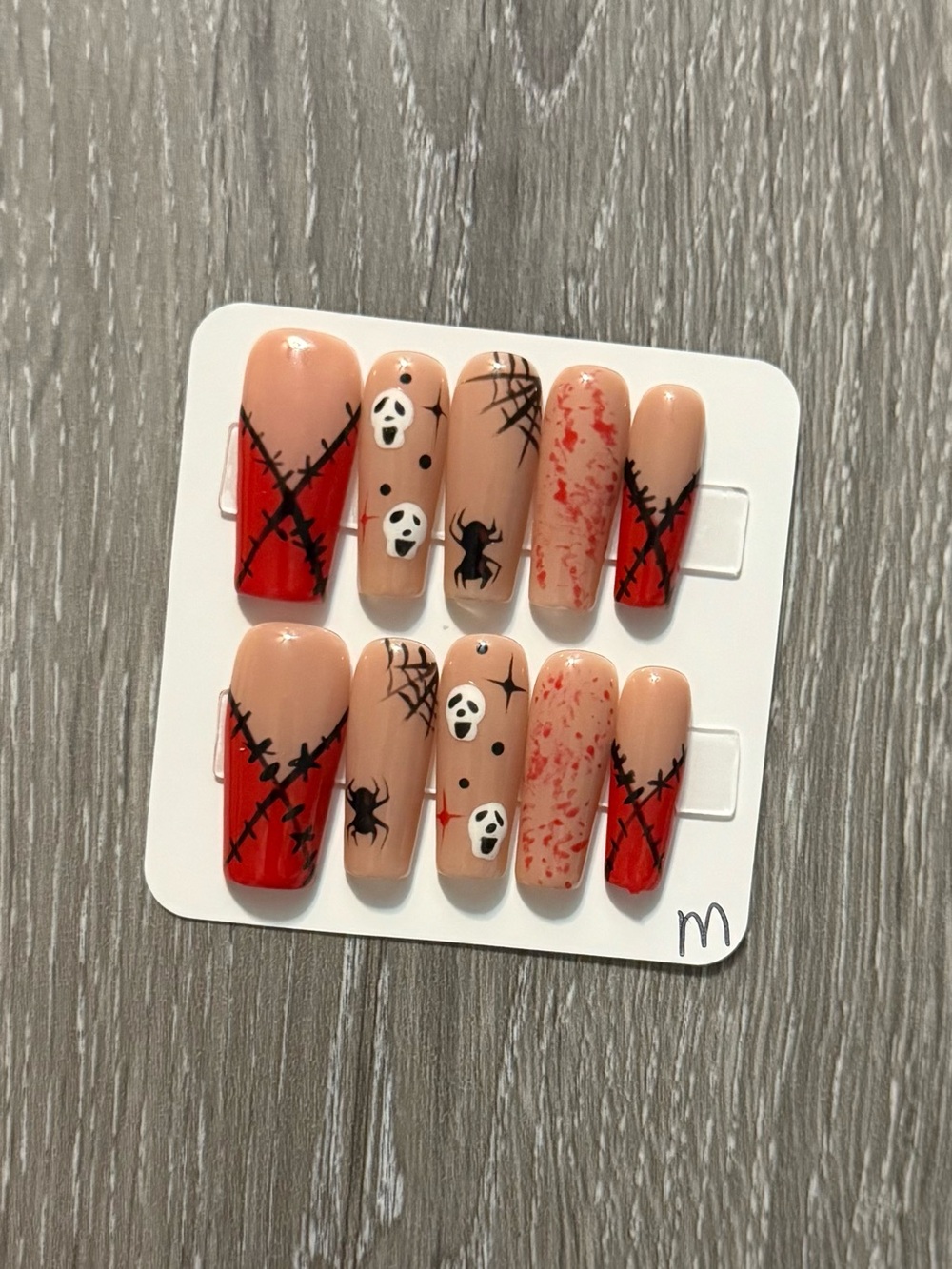 Spooky Stitch Press-On Nails in Nude and Red